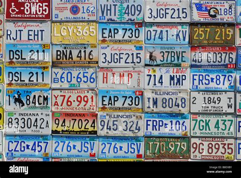 Wall of vintage license plates Stock Photo - Alamy