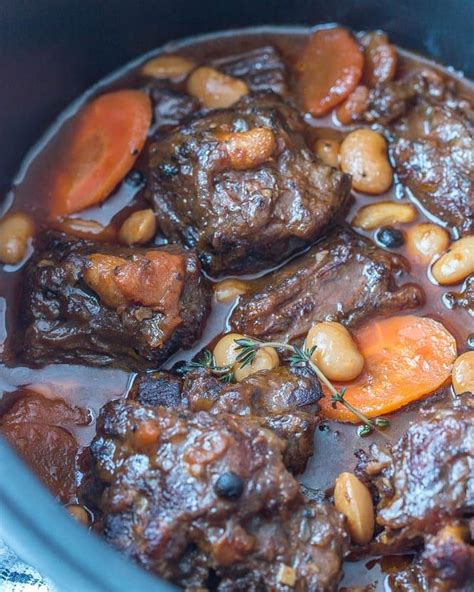 Slow cooker style Jamaican oxtail and butter beans. Stove top version of the recipe is available ...