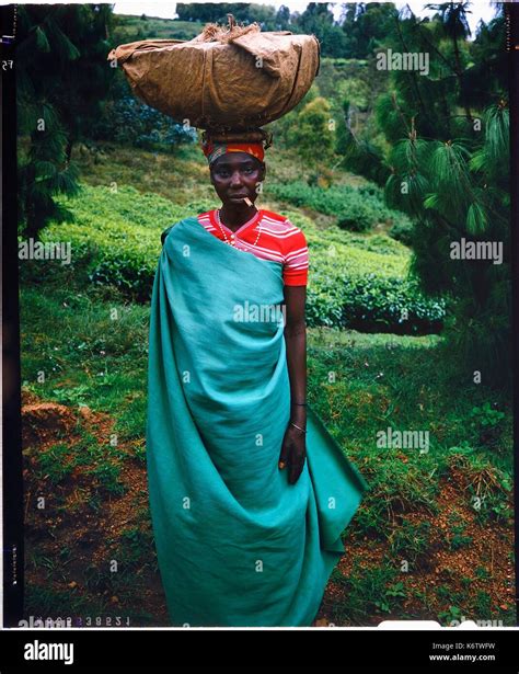 Burundi, Bujumbura Province, Ijenda area, Tutsi woman going to the ...