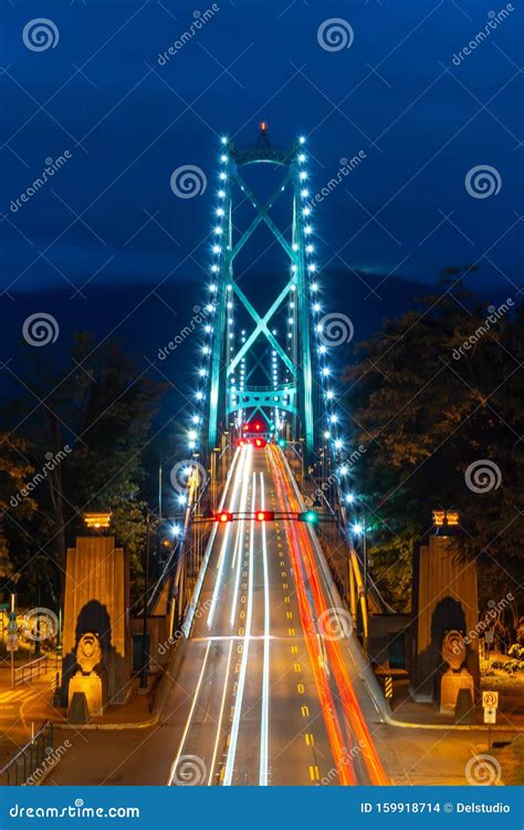 Lions Gate Bridge Illuminated at Night in Vancouver, British Columbia ...