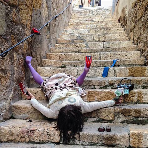 63 funny photographs of people posing as if they have fallen down ...