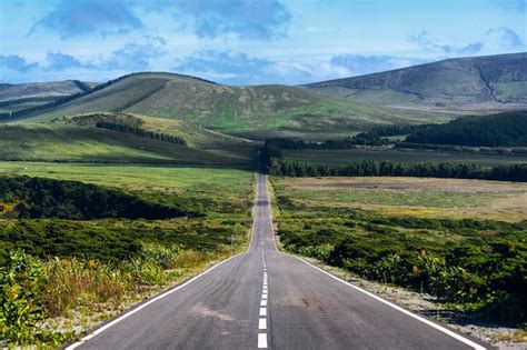 Premium Photo | A road leading to the mountains