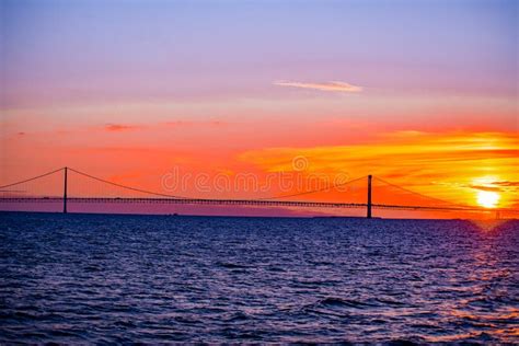 Mackinac Bridge at sunset stock photo. Image of morning - 256892116