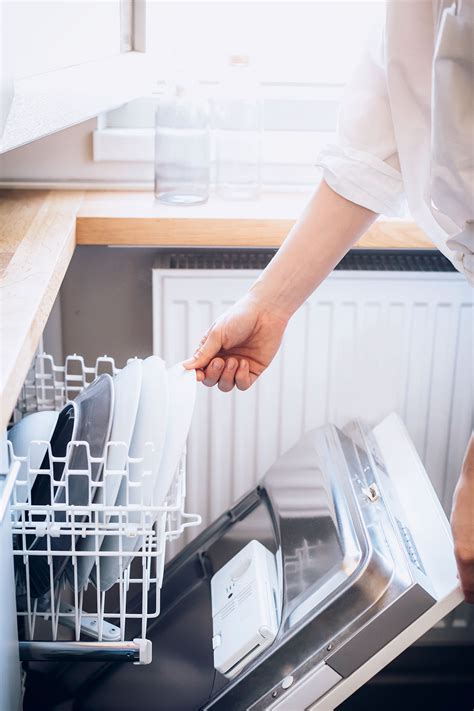 How To Clean The Dishwasher With Vinegar + Baking Soda | Hello Nest