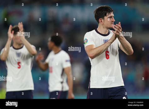 Rome. 3rd July, 2021. Harry Maguire (R) of England greets the ...