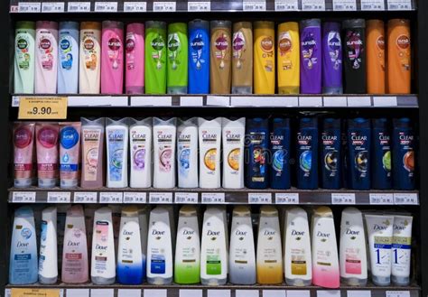 Various Brands of Shampoo Products on the Shelf in a Store Supermarket ...