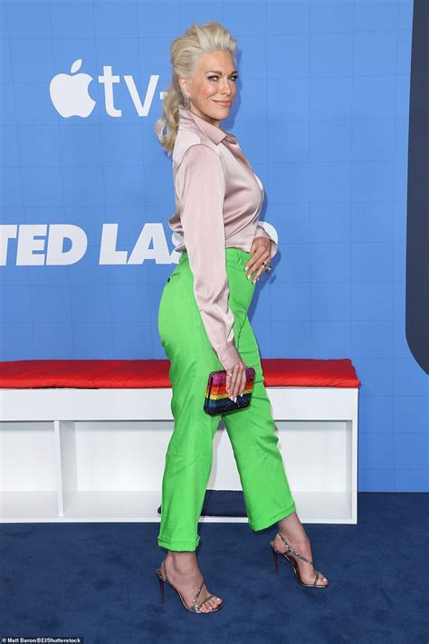 Hannah Waddingham dazzles in silk blouse and neon green pants while ...