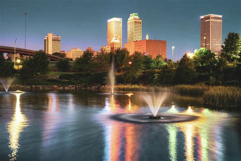 Dusk Lights Of Downtown Tulsa Oklahoma Over Centennial Park Lake ...