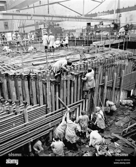 Builders assembling the reactor of the Kursk Nuclear Power Plant Stock ...