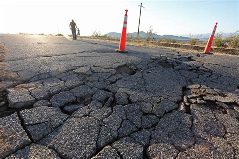 Strong aftershock jolts California as residents mop up after quake