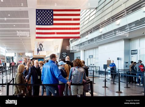 Boston Logan Airport; Passengers going through security to departures ...