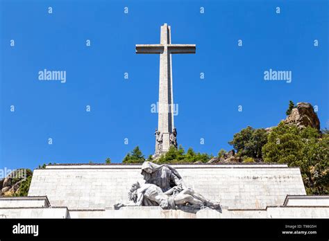 The passion of Christ statue and the big cross on the top of the Valley of the Fallen, Valle de ...