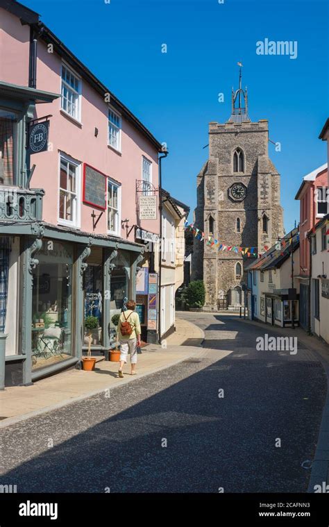 Diss Norfolk UK, view in summer of St Mary's Parish Church and independent shops in St Nicholas ...