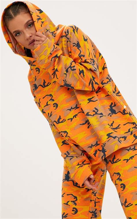 Orange Camo Oversized Hoodie In a orange camouflage print material and an oversized fit, thi ...