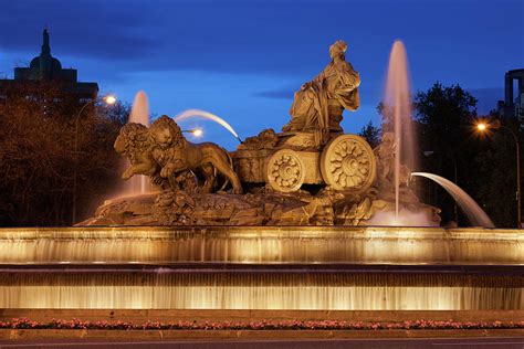 Cibeles Fountain Illuminated at Night in Madrid Photograph by Artur Bogacki - Pixels