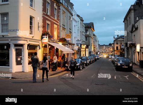 Pubs bars and cafes restaurants in Clifton village area of Bristol at dusk summer evening UK ...