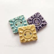 Set of three handmade ceramic buttons - Folksy