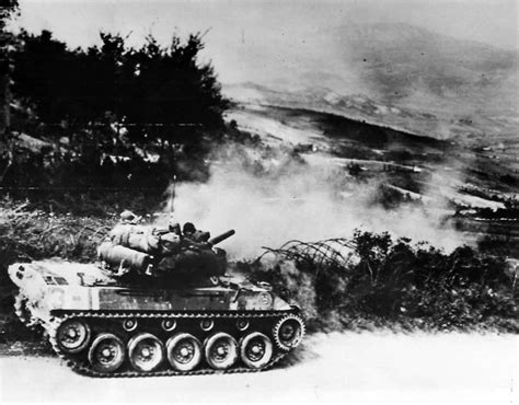 M18 Hellcat of the 805th Tank Destroyer Battalion in action near ...