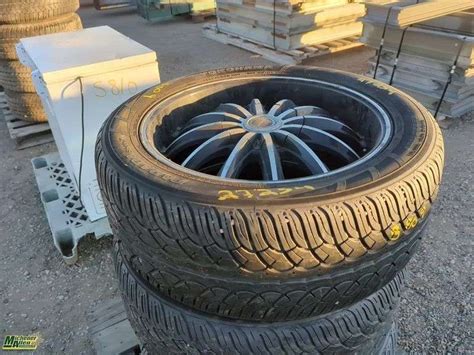 Yokohama 275/45R20 Tires on Rims - Michener Allen Auctioneering Ltd