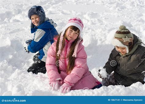 Children Playing In Snow Stock Image - Image: 1867141