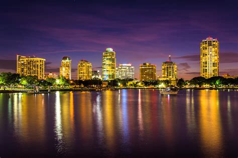 The Skyline At Night Seen From Spa Beach Park In Saint Petersburg Florida Photograph by Jon Bilous