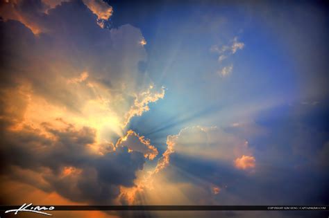 Heavenly Rays from Above Sunrays Beam of Light Clouds | Royal Stock Photo