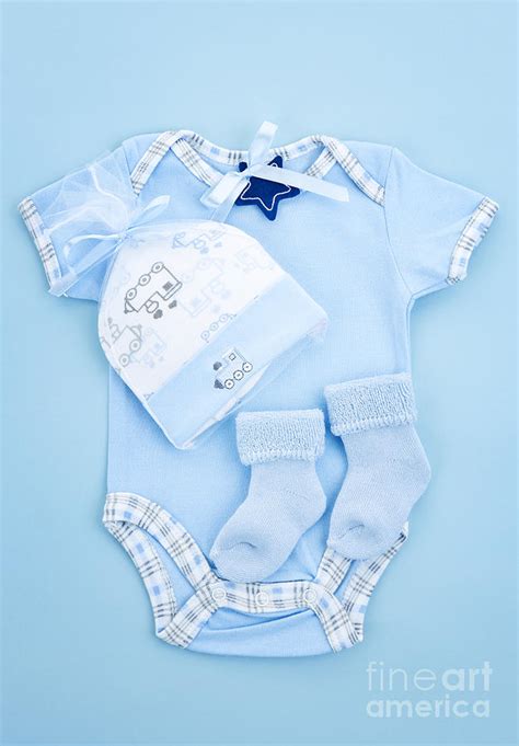 Blue baby clothes for infant boy Photograph by Elena Elisseeva