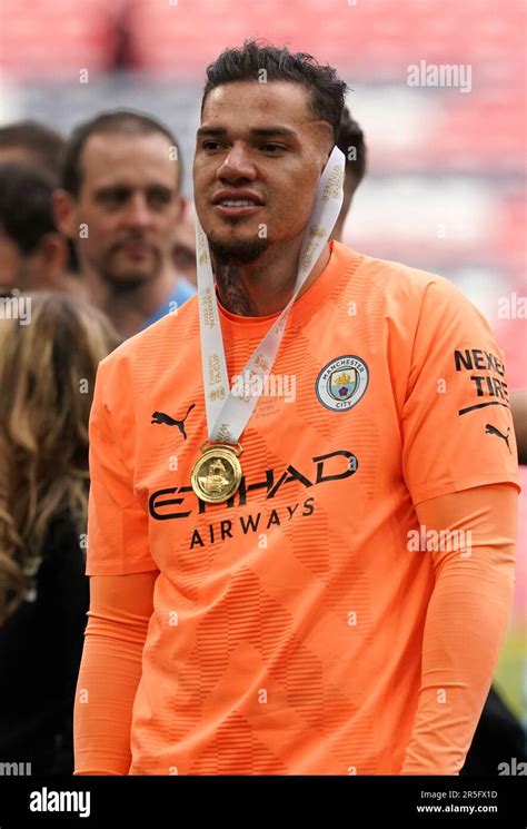 Manchester City goalkeeper Ederson with his winner's medal following the Emirates FA Cup final ...