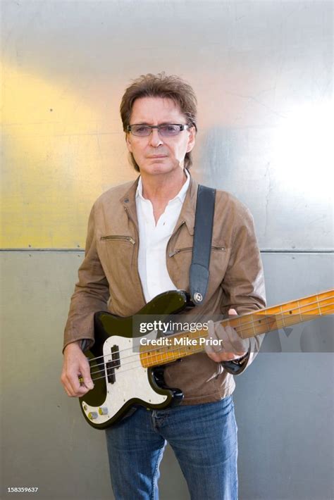 English bass guitarist Bruce Foxton posed with bass guitar in London... News Photo - Getty Images