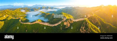 The Great Wall of China at sunrise,panoramic view Stock Photo - Alamy