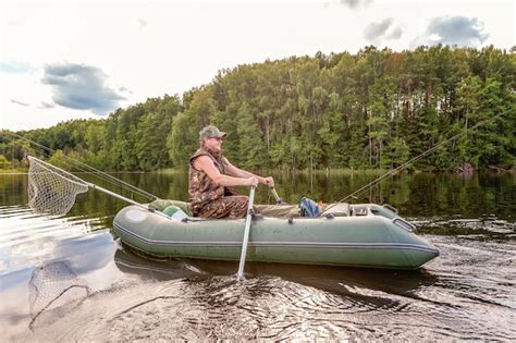 Premium Photo | Fisherman in a boat