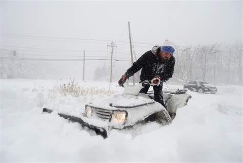 Photos: See the aftermath of massive snowfall in the…