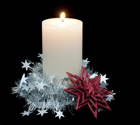 Photo of burning festive candle | Free christmas images
