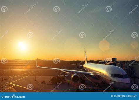 Airport terminal at sunset stock photo. Image of arrival - 174251092