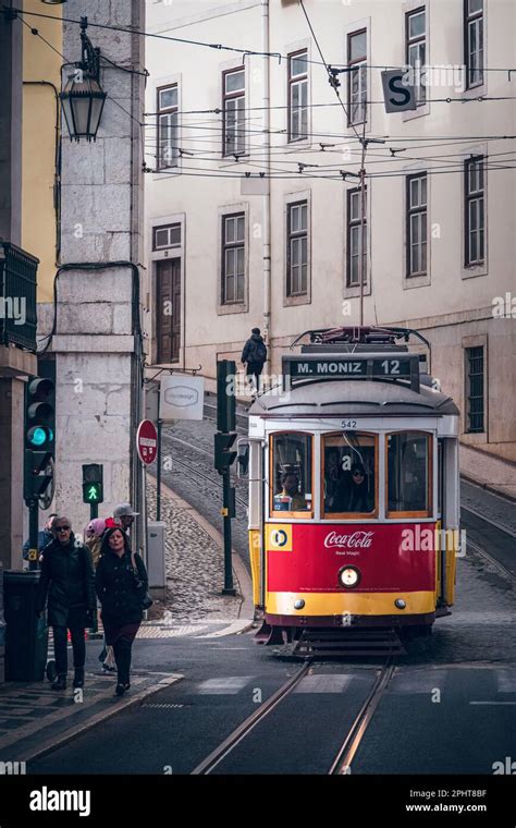 Old tram through the streets of beautiful Lisbon Stock Photo - Alamy