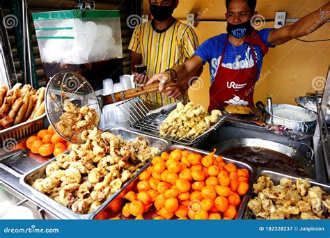 Street Food Vendors Sell Assorted Deep Fried Food in Their Food Cart ...