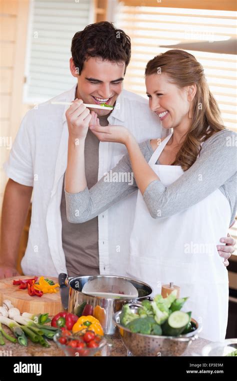 Couple having fun cooking together Stock Photo - Alamy