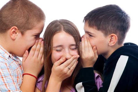 Two Teenage Boys Telling Jokes To Teenage Girl Royalty Free Stock Images - Image: 23374849