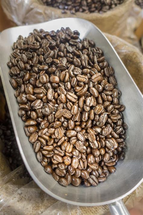 Dry Roasted Coffee Beans at Marketplace Stock Image - Image of aluminum ...