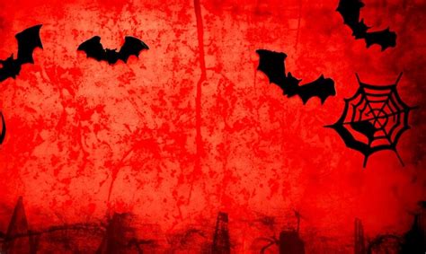 Premium AI Image | photo grunge red background with halloween silhouettes