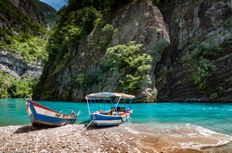 Take One of the Best Boat Trips of Your Life On Albania's Lake Koman