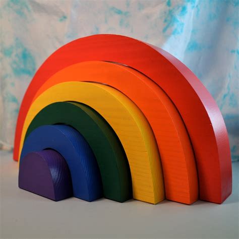 Wooden rainbow from TheEnchantedCupboard @ Etsy | Wooden rainbow, Rainbow toy, Kids wooden toys