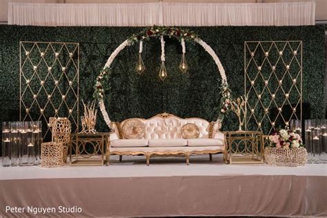 Green background for Indian wedding reception stage decoration. in 2021 | Stage decorations ...