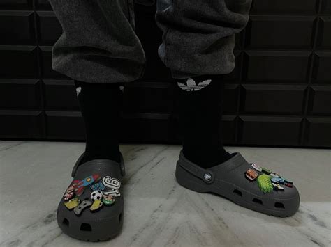 Grey crocs🖤🤍 | Crocs fashion, Crocs outfit, Crocs with jibbitz