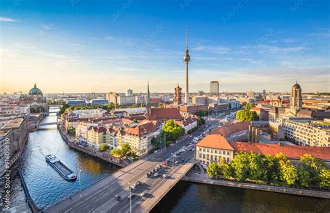 Berlin skyline panorama with TV tower and Spree river at sunset ...