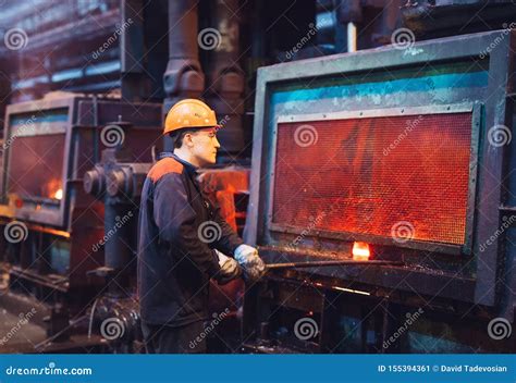 Workers in the Steel Mill. Factory Worker Takes a Sample for Metal ...