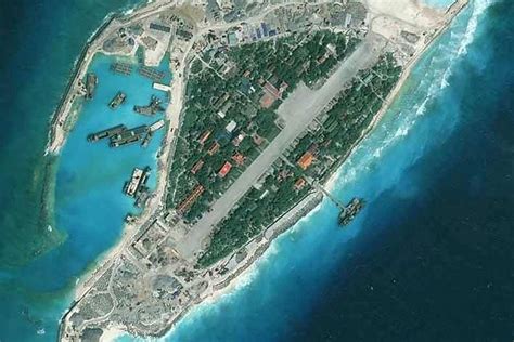 Risking China's ire, Vietnam begins dredging on South China Sea reef ...