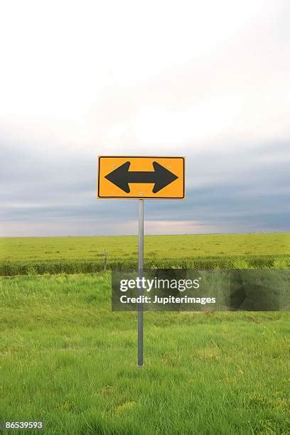 143 Double Arrow Road Sign Stock Photos, High-Res Pictures, and Images - Getty Images