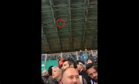 Watch: Napoli fans throw beer bottles and urine at Milan fans in the stands