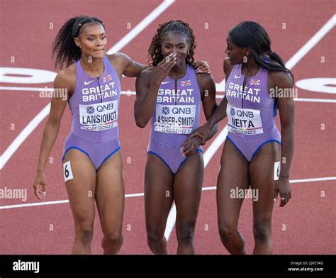 Imani Lansiquot and Daryll Neita (GB&NI) giving Dina Asher-Smith a hug ...